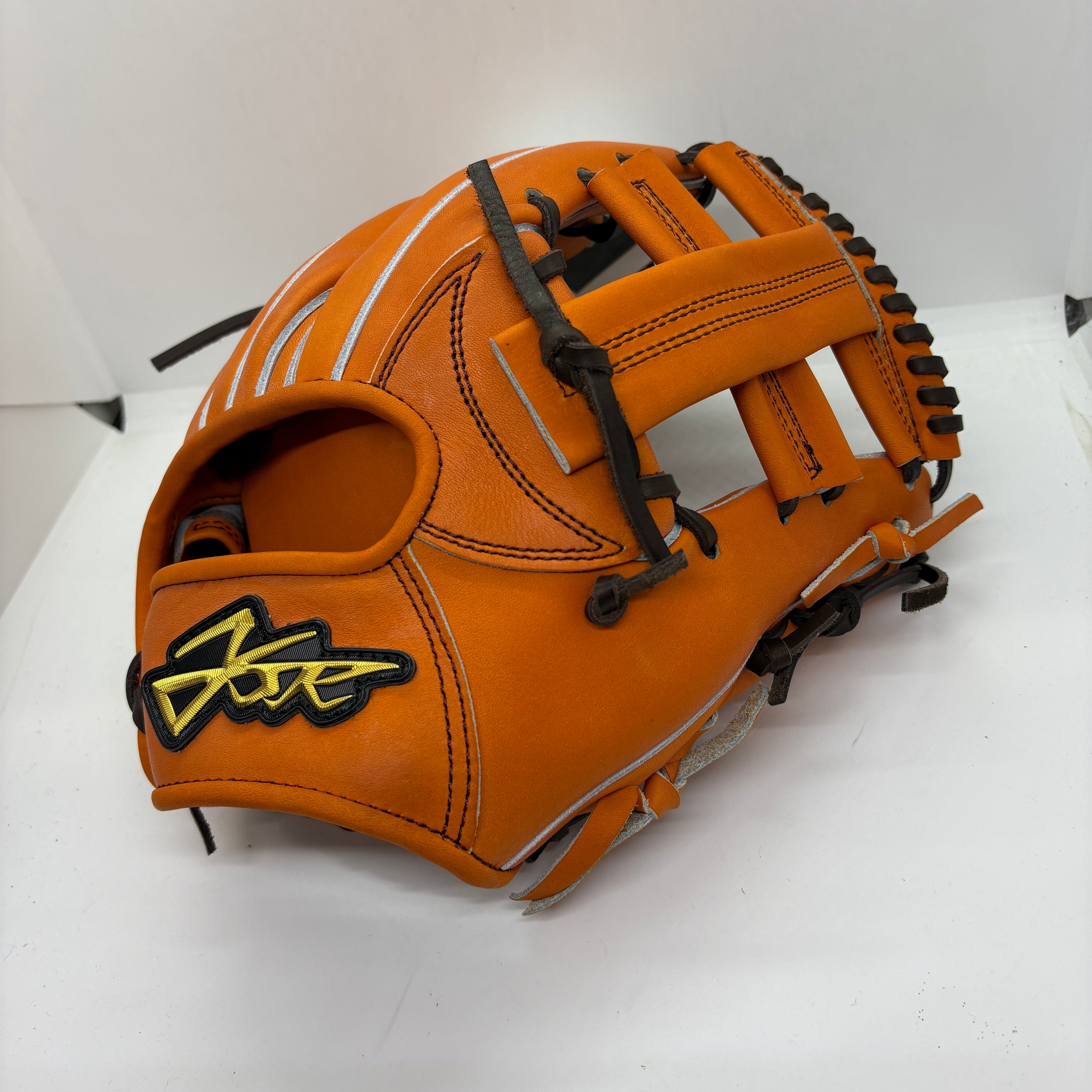 RYU 硬式外野手用 701型 MブラックXブロンド紐 左投げ【型付け、送料