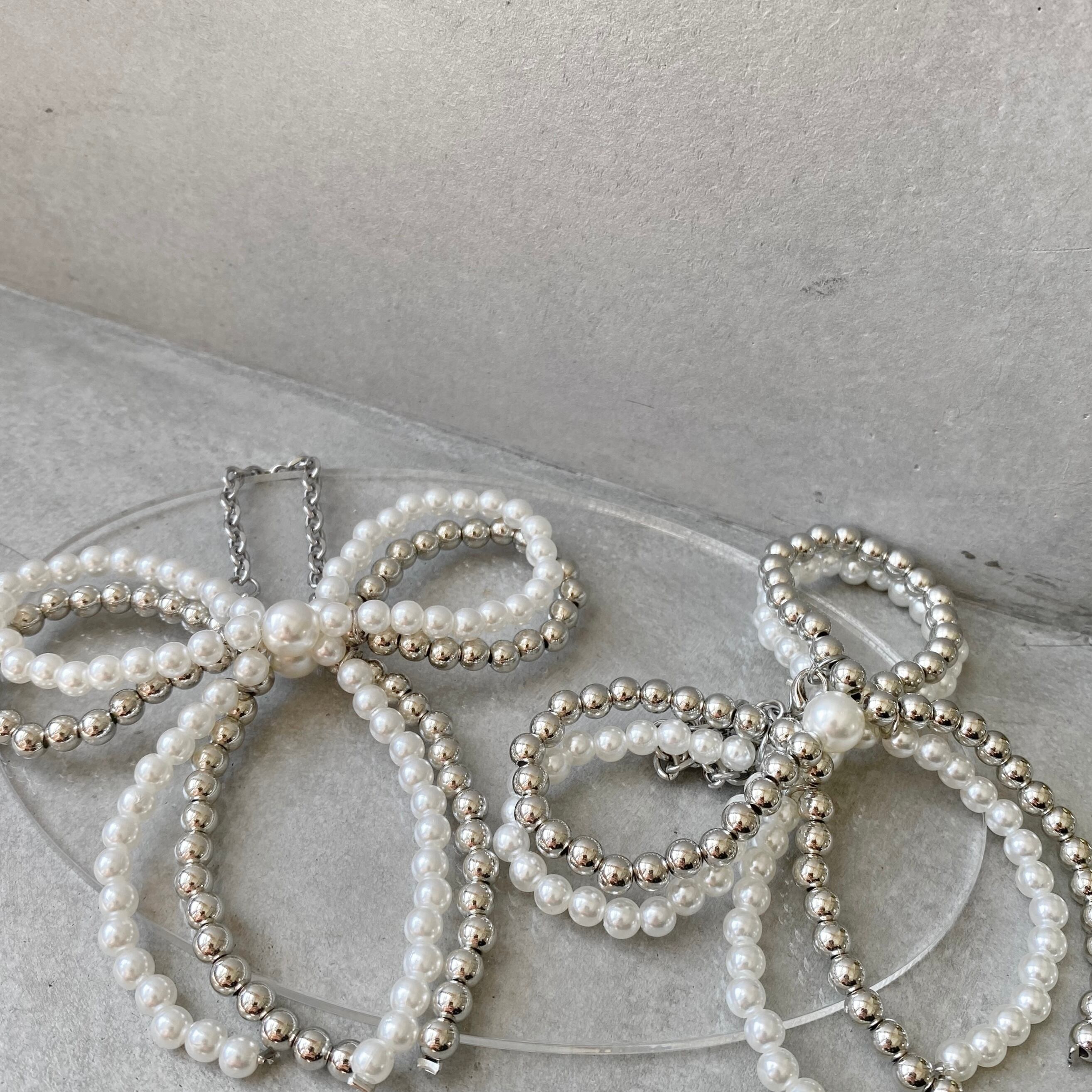 パールリボンチャーム | conforobe(コンフォローブ)