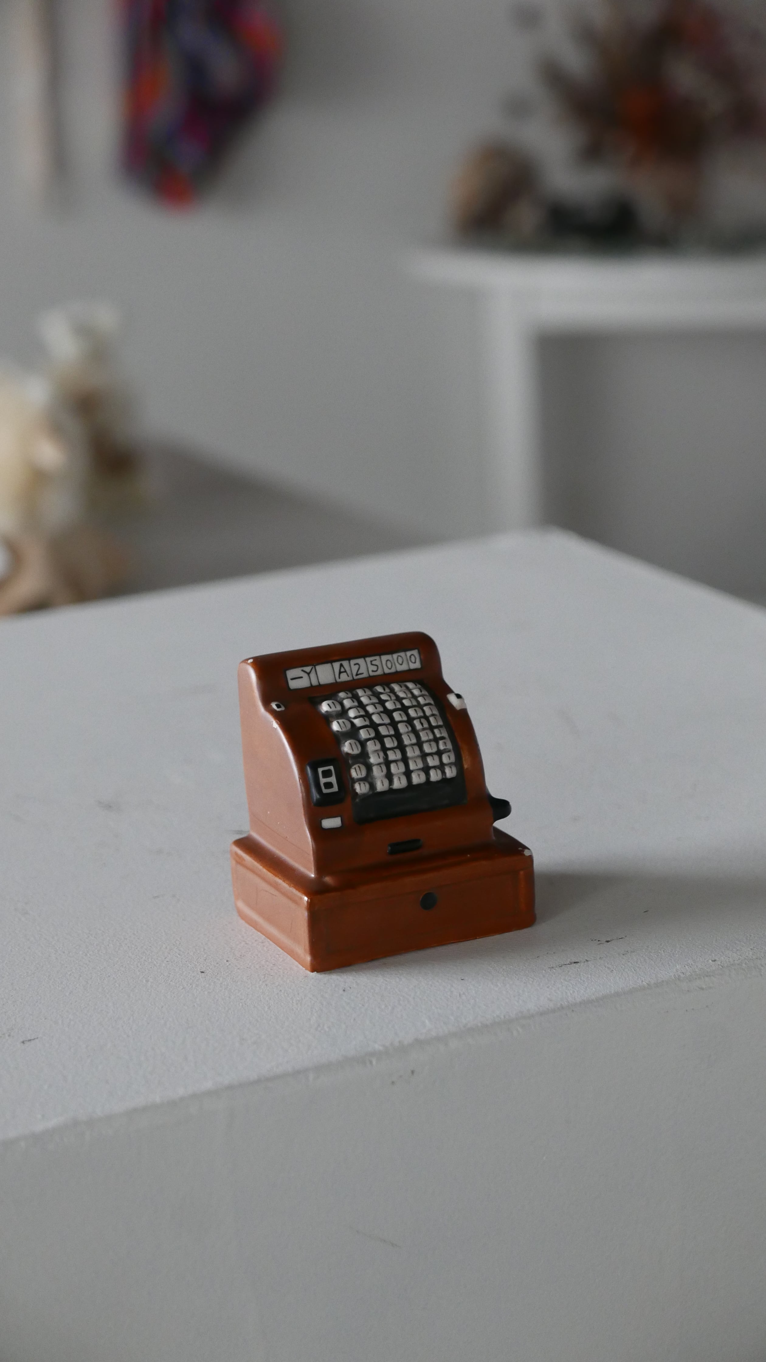 coin bank , register motif