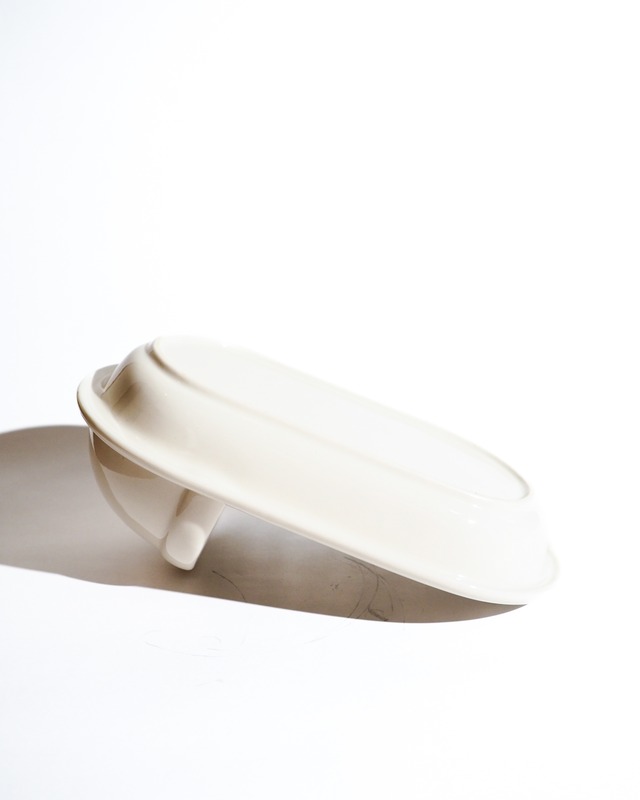 Ceramic container for a pit toilet