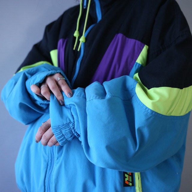 cyber neon color over silhouette zip-up blouson