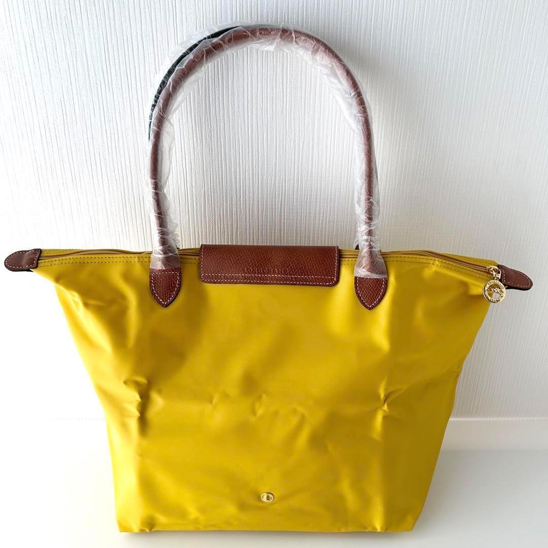 新品 Longchamp ポーチ 辛子色