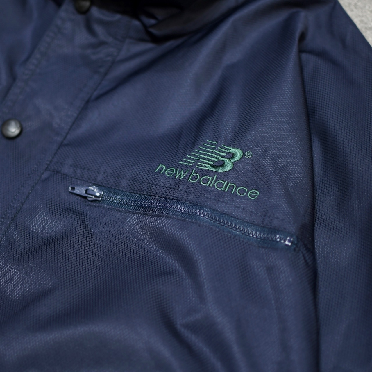 New Balance half snap design nylon pullover
