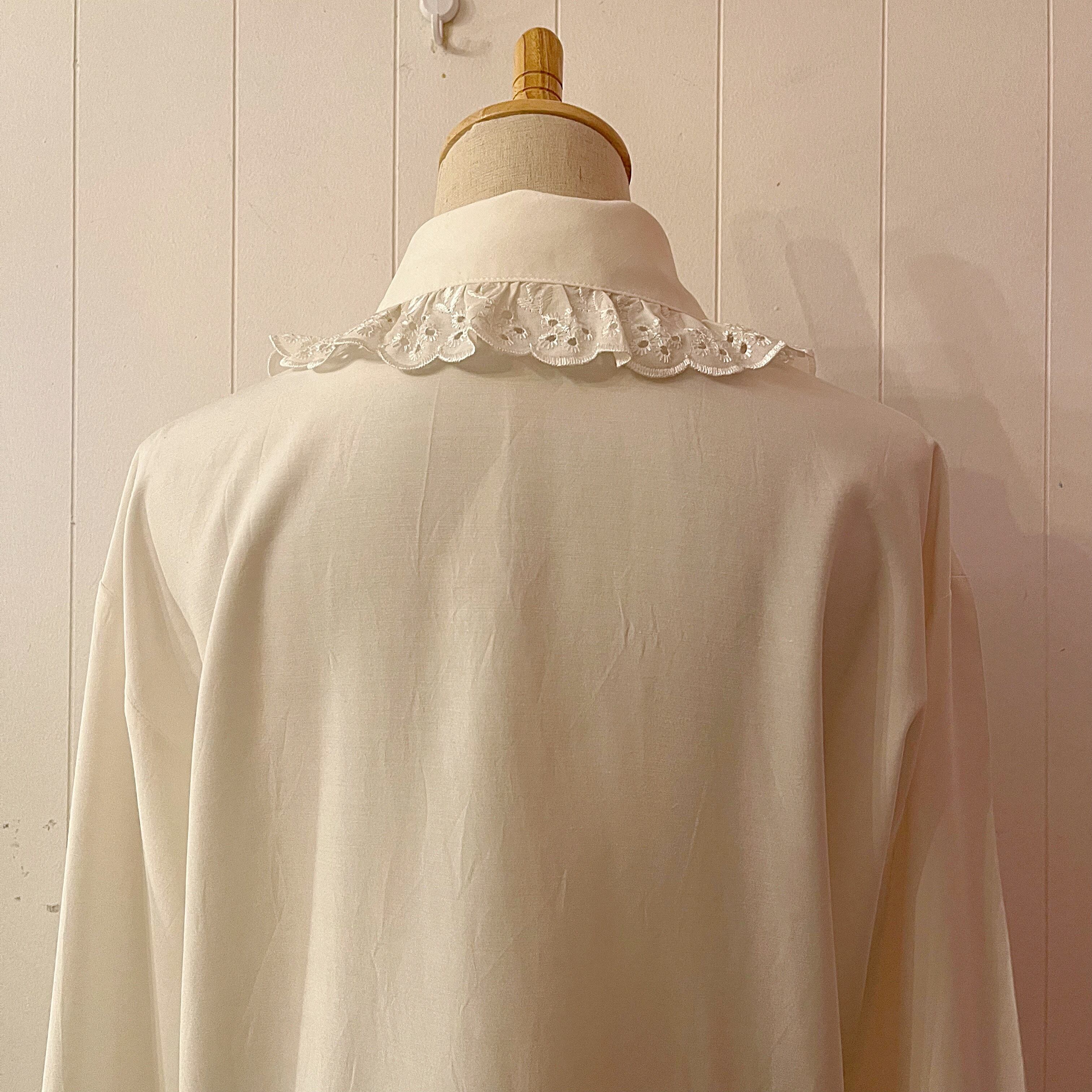 big frill cuffs white blouse