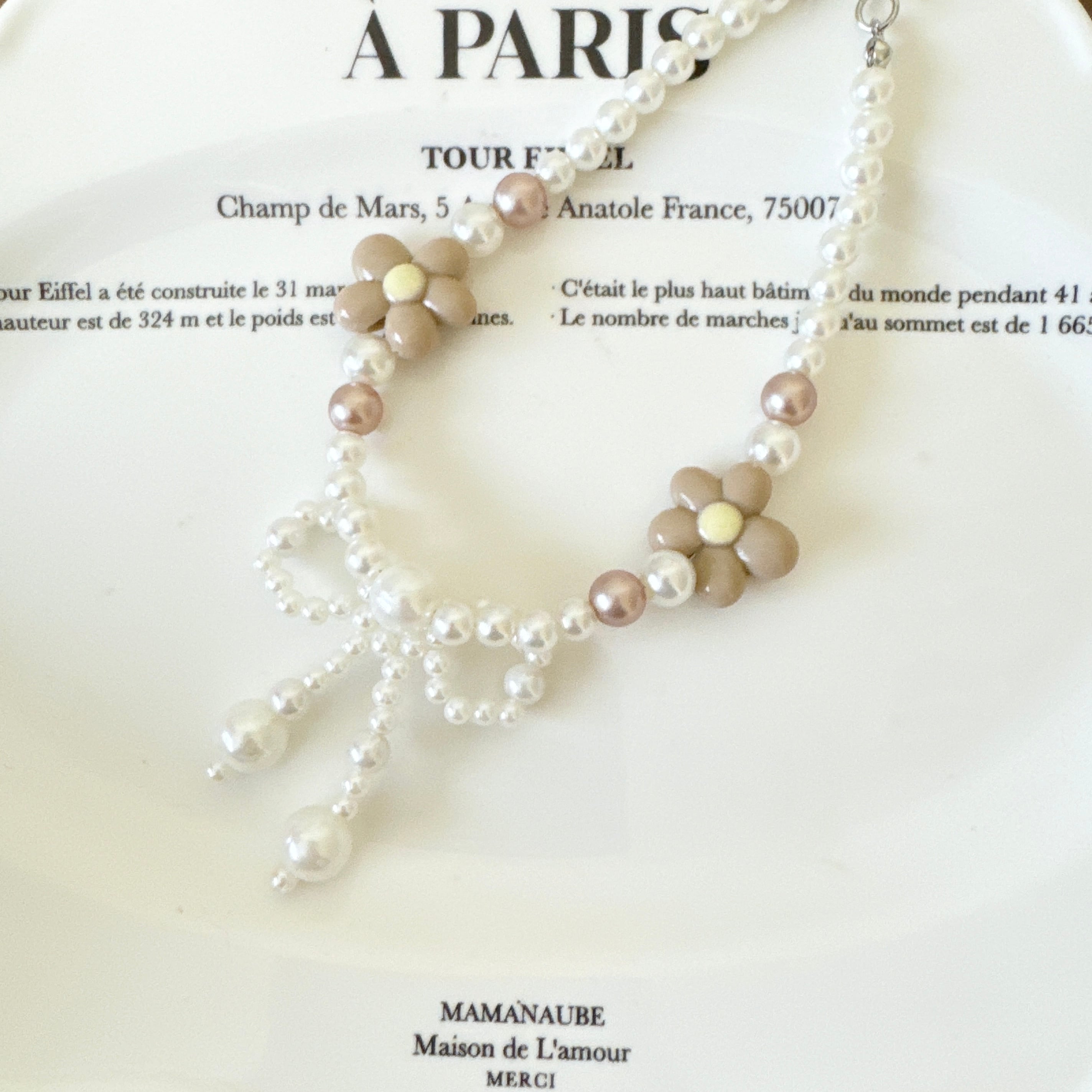 淡色お花とパールリボンのネックレス