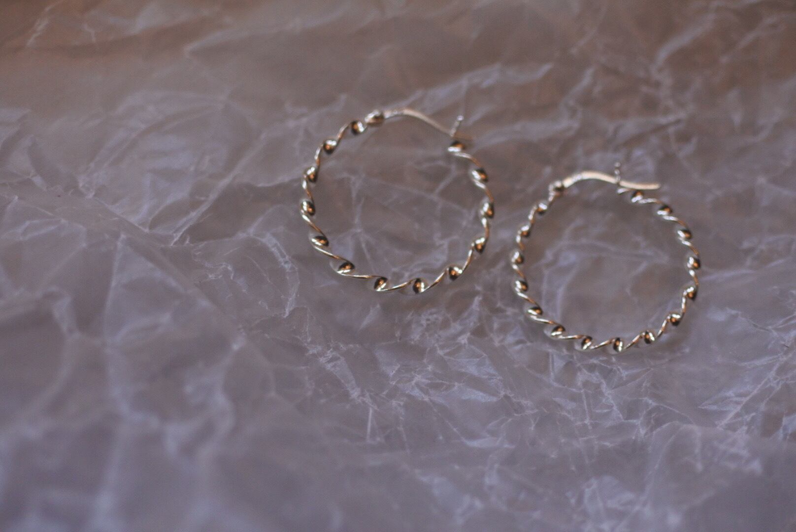 925silver Twisted hoops.