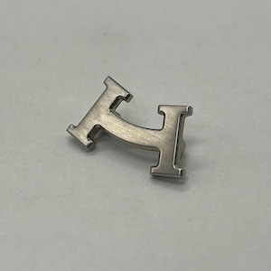 エルメス HERMES Hスマイル ピン ブローチ シルバーカラー