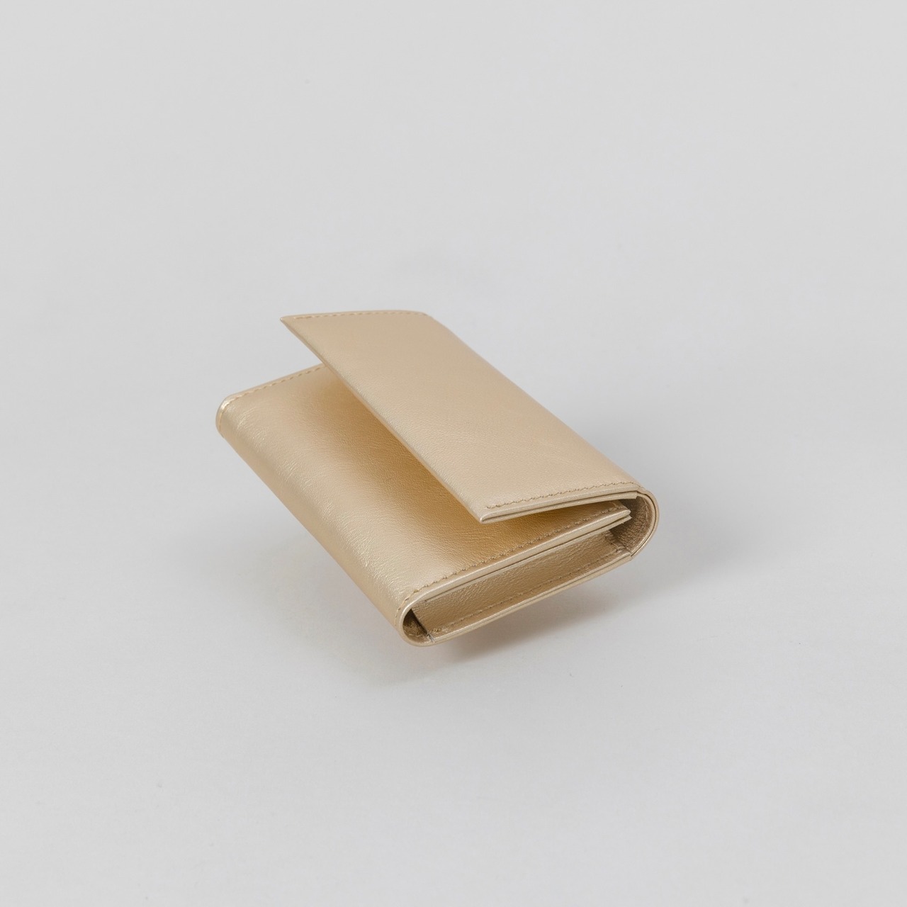 E R A. SPRKNG BUSINESS CARD CASE