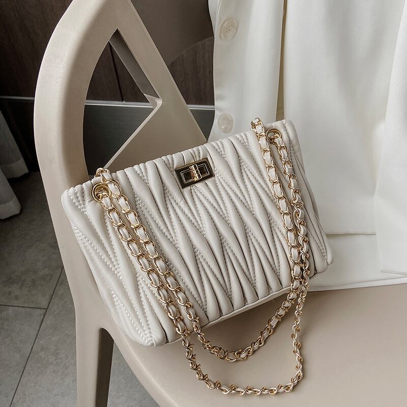 バッグ女性の大容量2020野生のひし形メッセンジャーバッグの新しいトレンディなバージョンネットレッドエグインエアチェーンバッグバケットバッグ Tiancai_Wing_Bag4679795