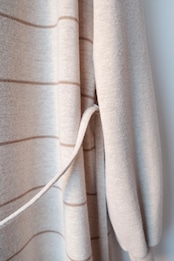 Neutral color asymmetric neck knit dress