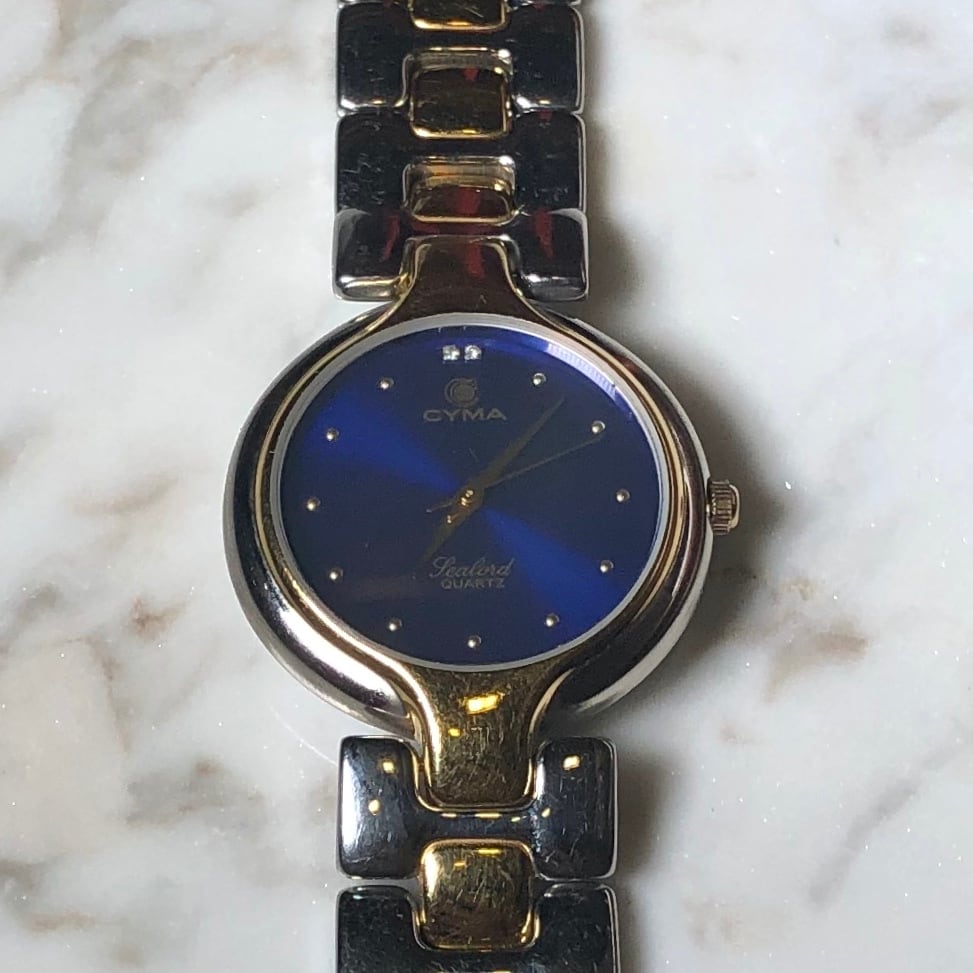 CYMA blue dial quartz watch | NOIR ONLINE