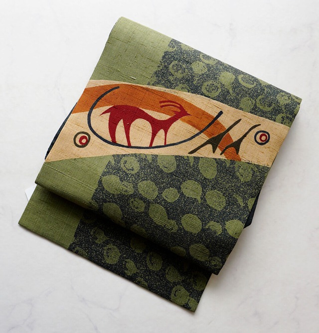 【なごや帯】高麗納戸色系　動物文　紬地なごや帯