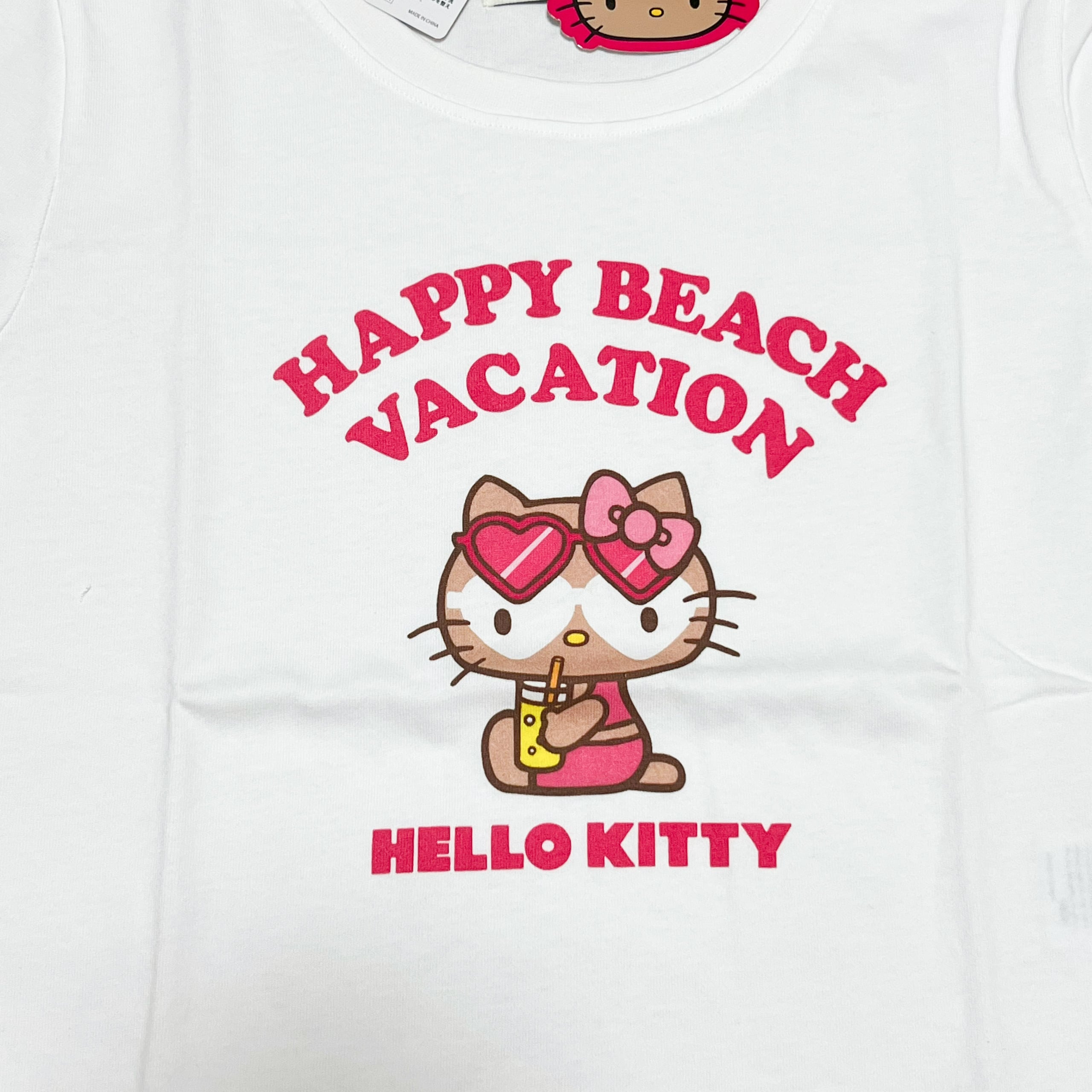 公*o様 激レア★希少★沖縄限定★日焼け【チャーミーキティ】 沖縄限定 日焼け ハローキティ Tシャツ クロップド丈 ホワイト