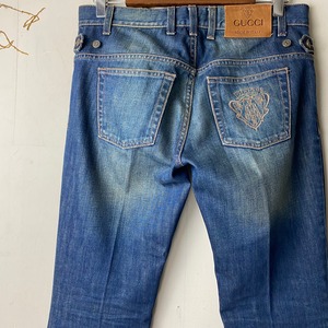 GUCCI “crest” embroidery denim pants