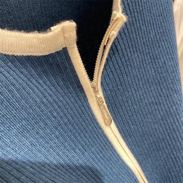 バイカラージッパートップス