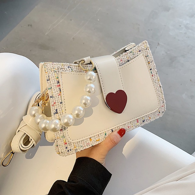 オールマッチウエスタンスタイルレディースワンショルダー脇の下スモールバッグ女性2020人気の新しい流行のファッションネットレッドメッセンジャースモールスクエアバッグ Tiancai_Wing_Bag89609578125