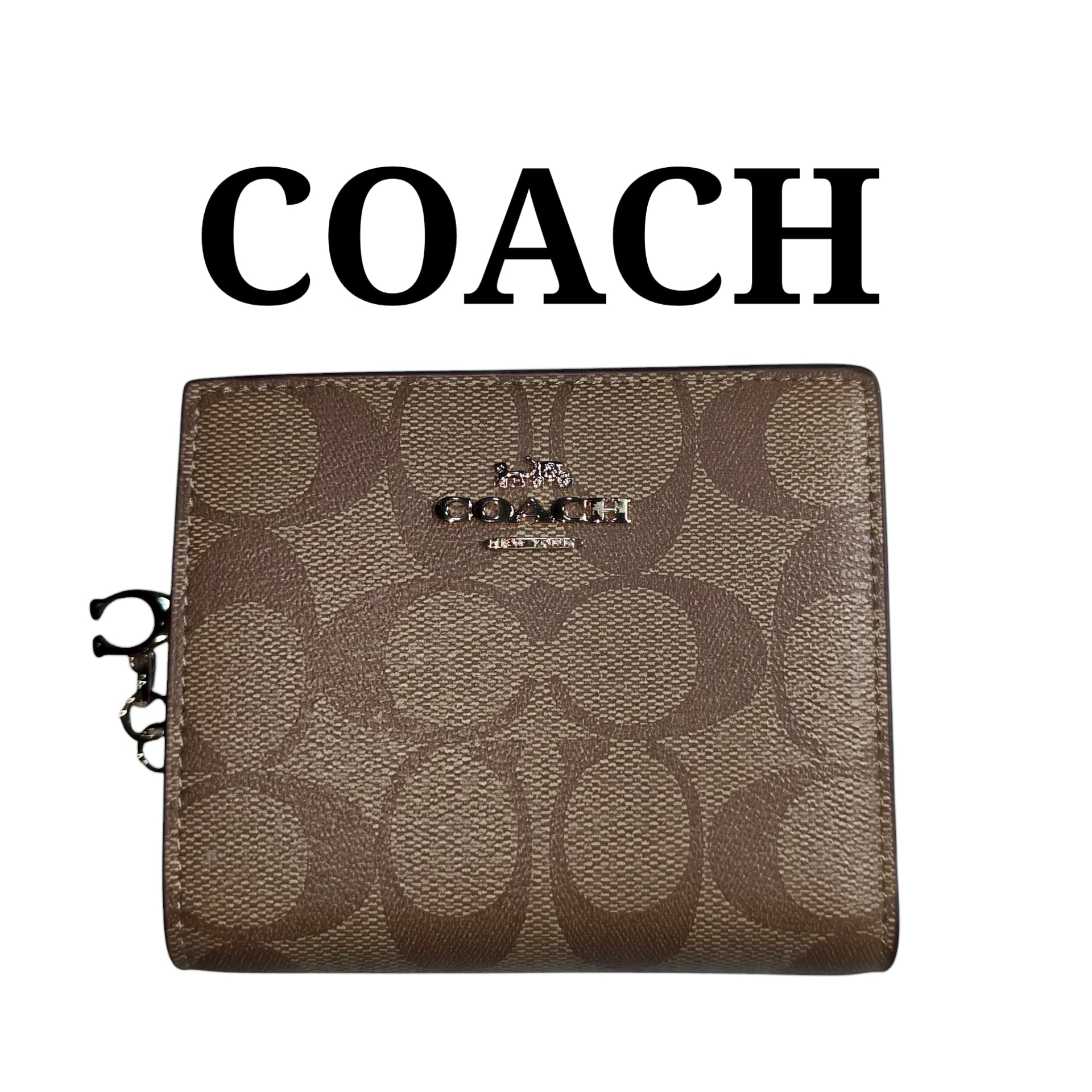 COACHコーチ 二つ折り財布 シグネチャーエンボス パープル | francore