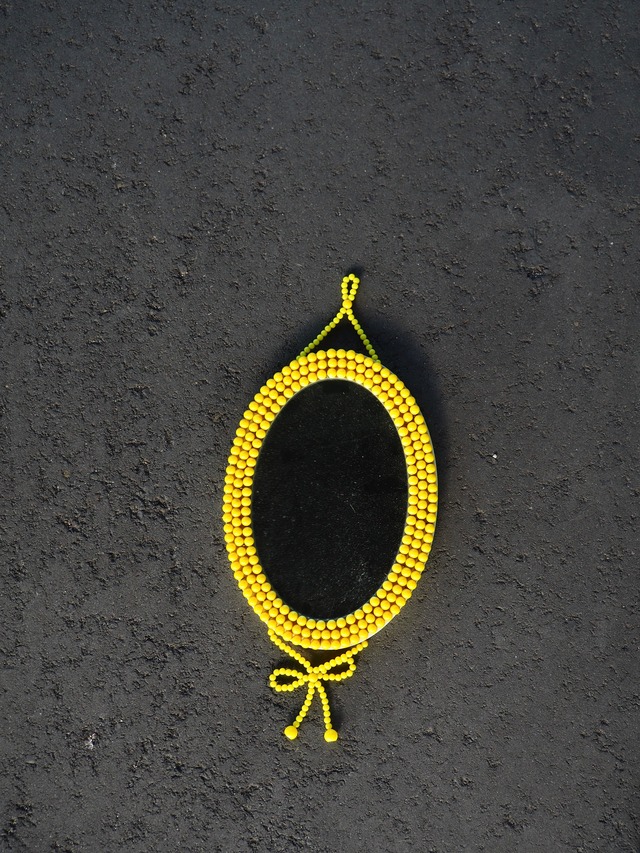 Yellow beaded oval wall mirror