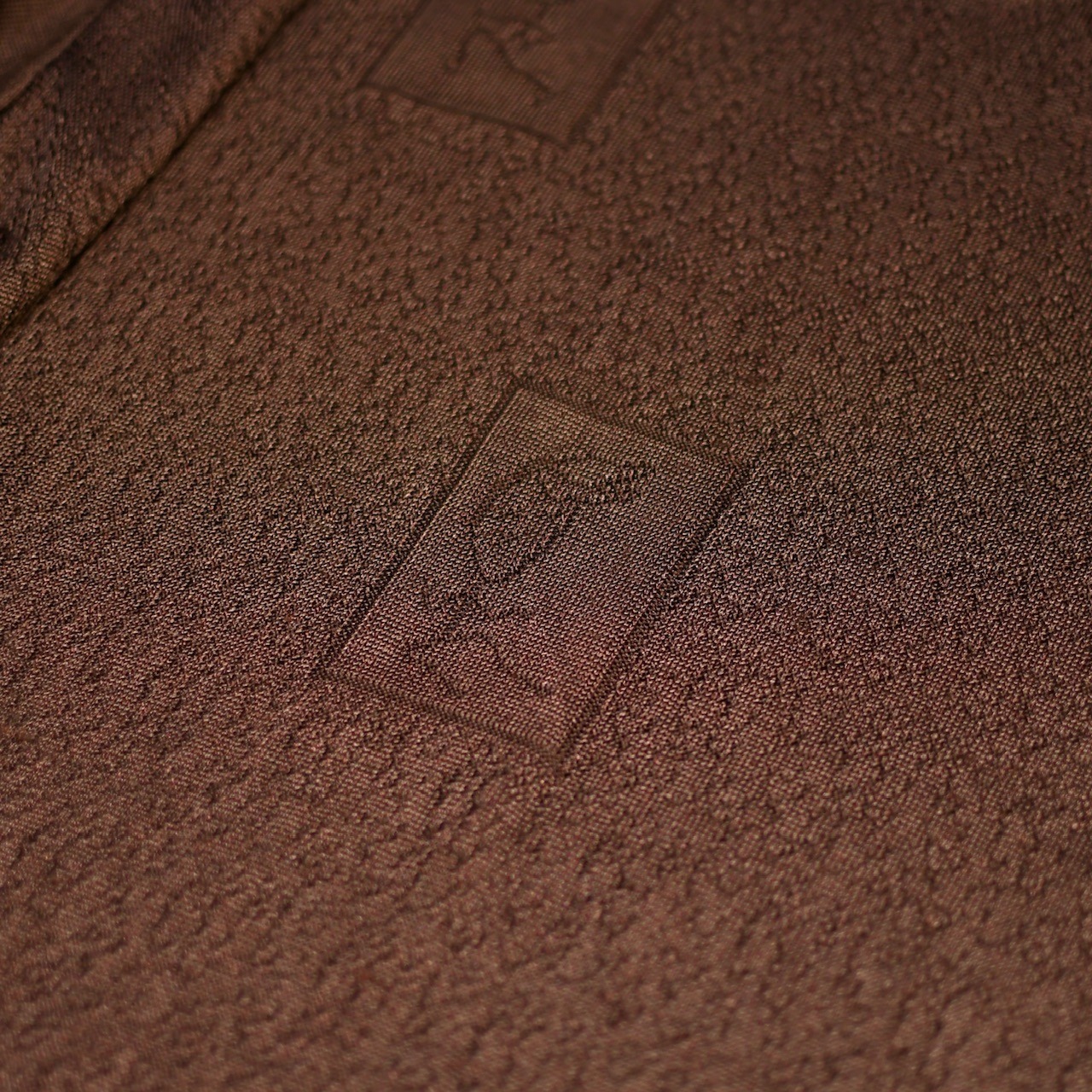character design knit polo brown