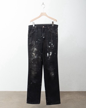 "Wrangler" artistic paint yarn-dyed black denim trousers