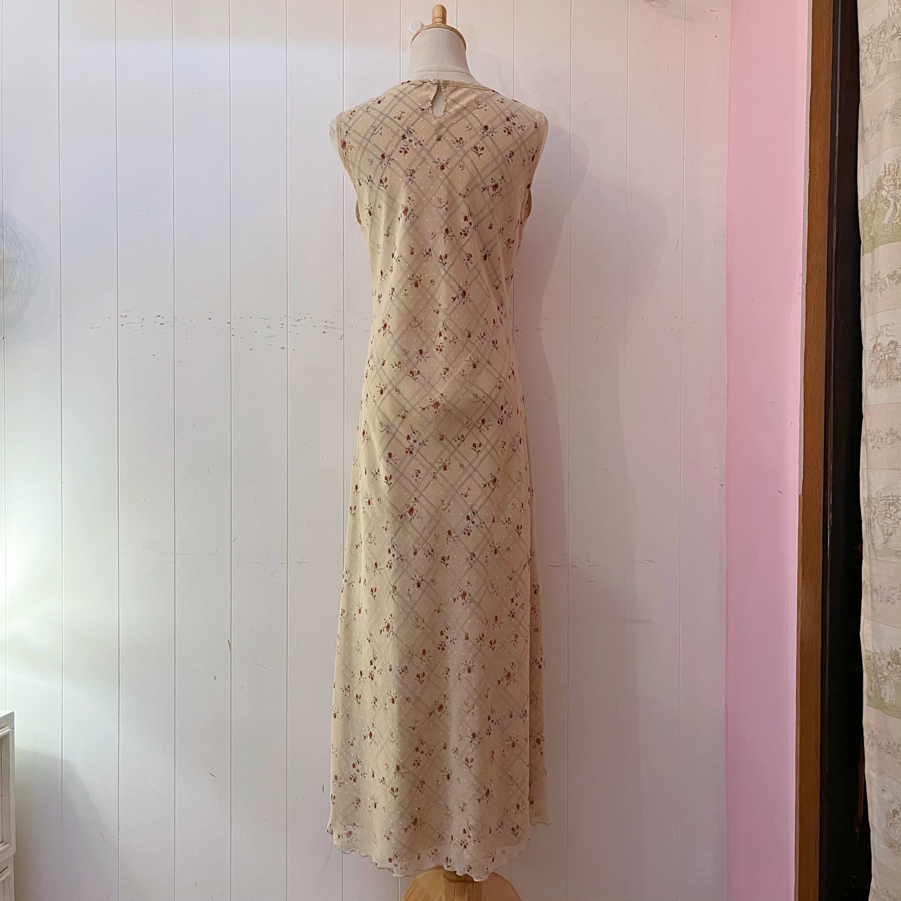 flower check sleeve less one-piece
