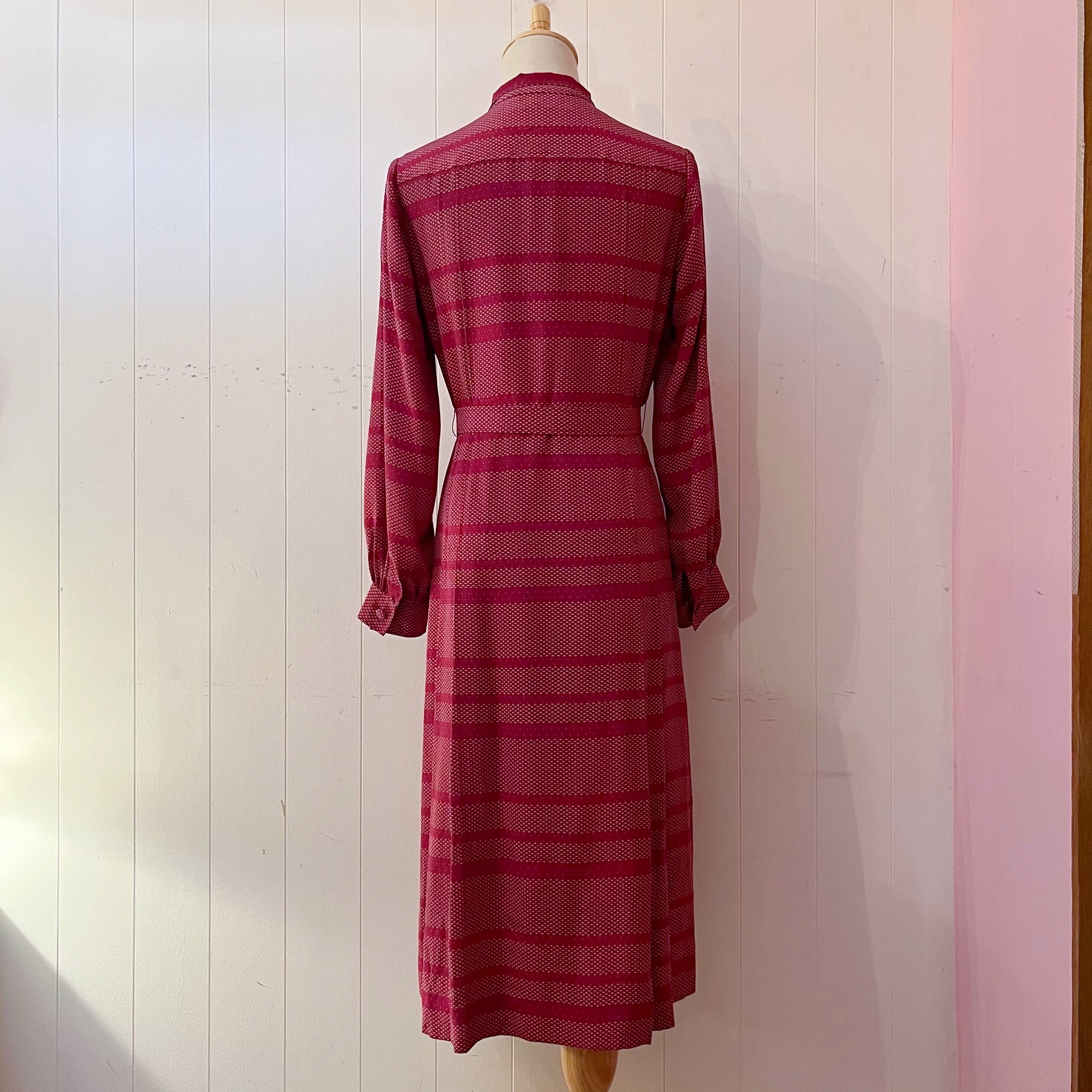 red ribbon tie tuck one-piece
