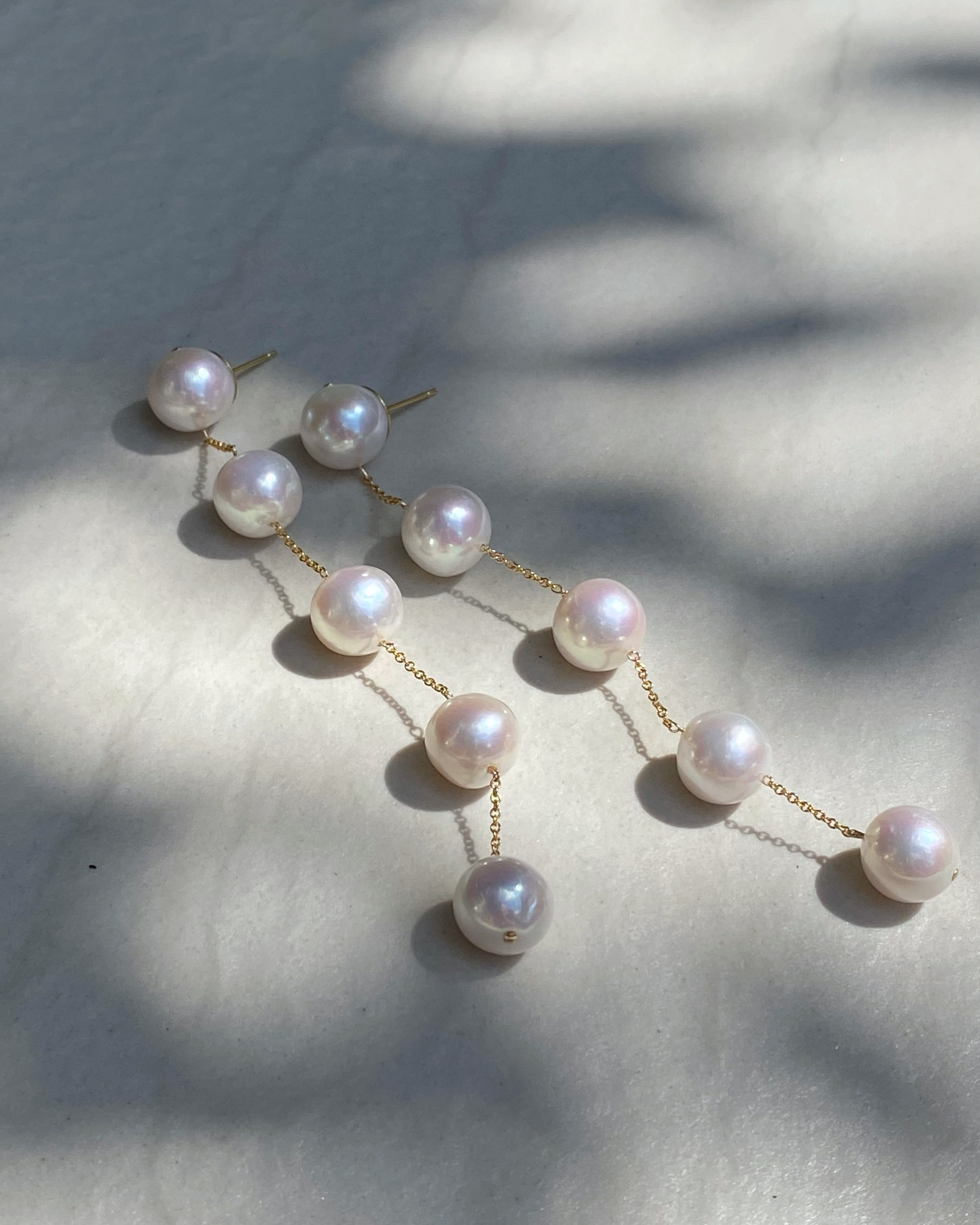 5 long pearl earrings