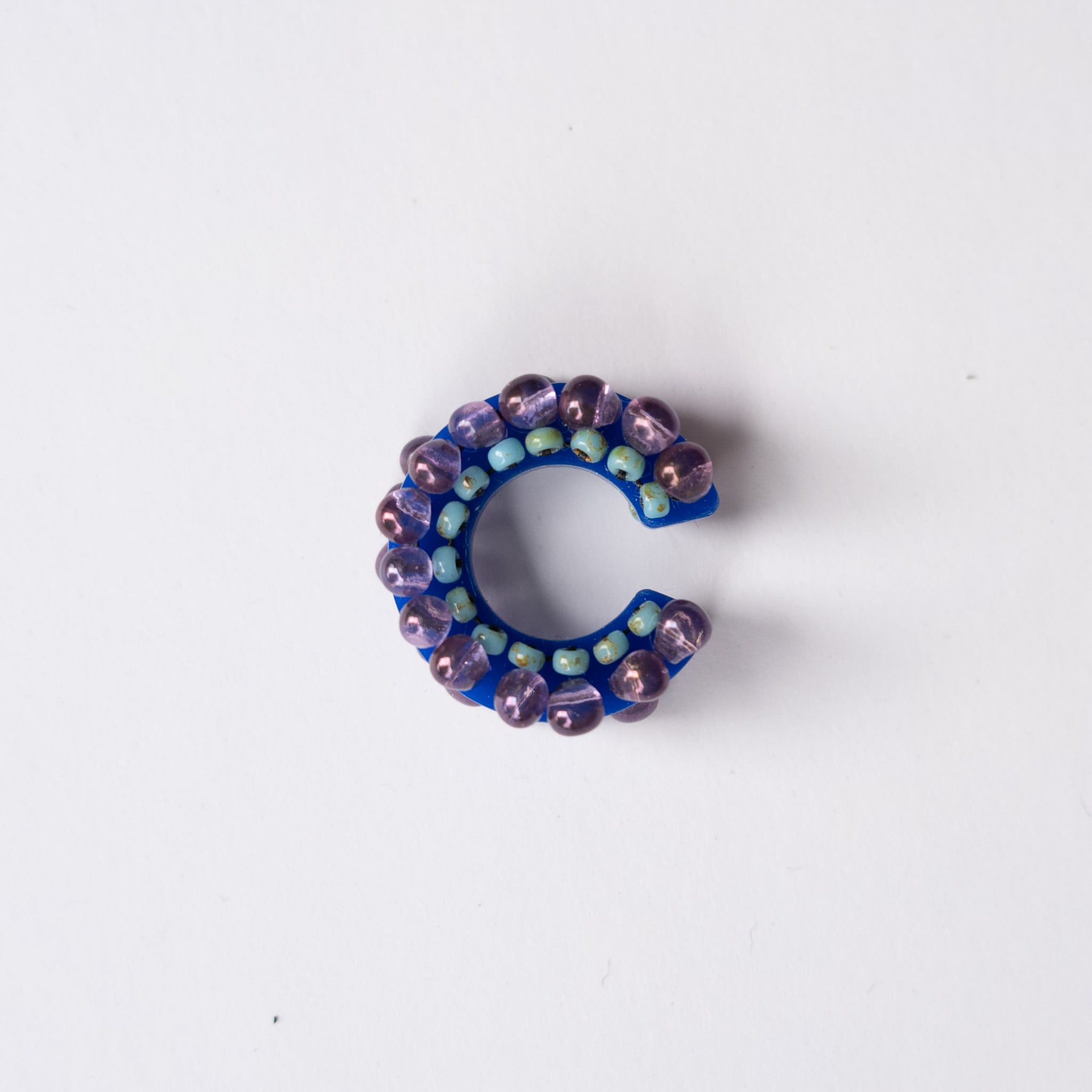 puzzle ring ear cuff [52]