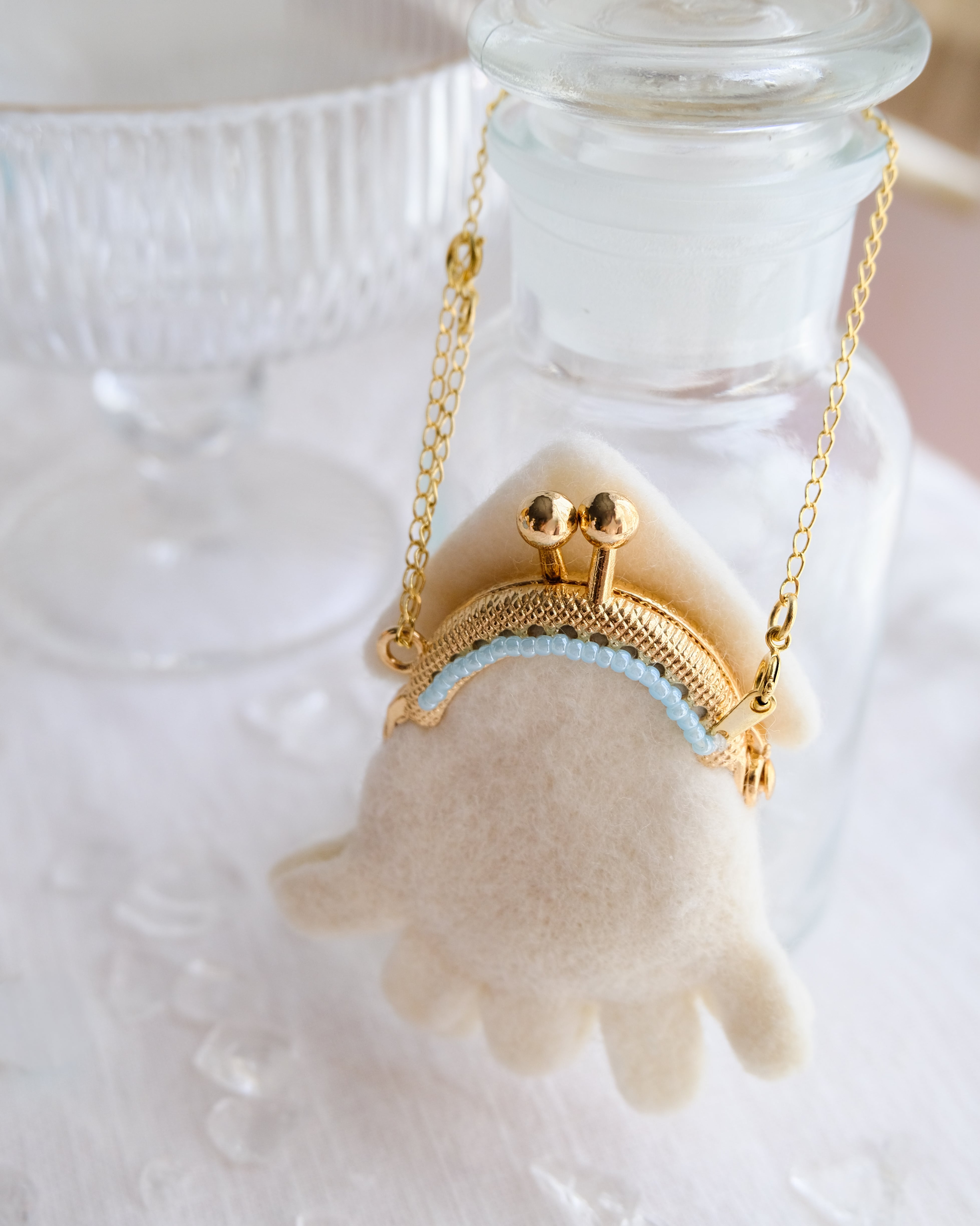 羊毛フェルトのミニミニイカポシェット | すゆあん