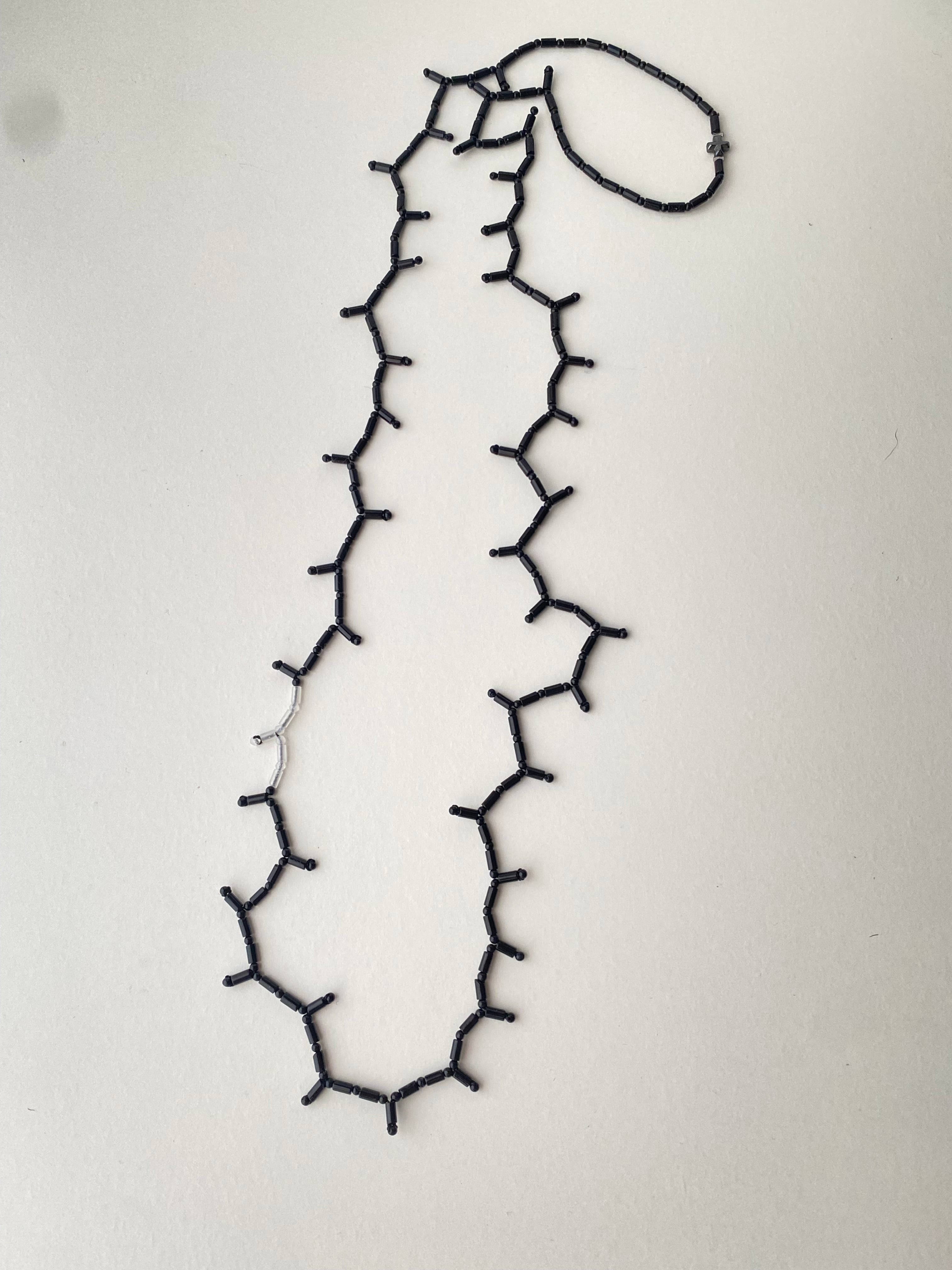 long stone necklace black