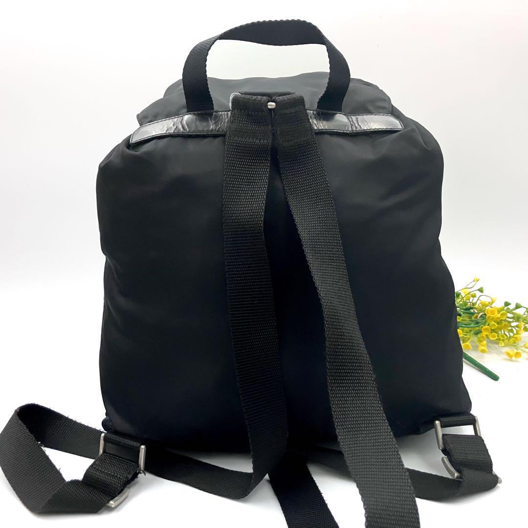 【美品】プラダ リュック バックパック 巾着バッグ ナイロン 三角プレート 黒 美品】プラダ リュック バックパック 巾着バッグ ナイロン 三角