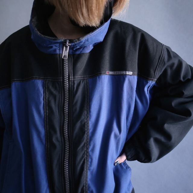 "reversible" bi-color tech design and full pattern fleece design blouson