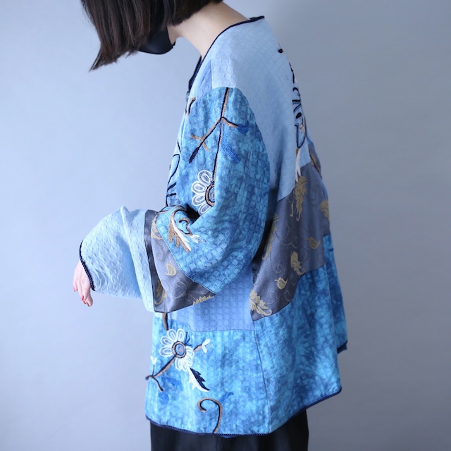 beautiful blue color flower embroidery design over silhouette gobelins jacket