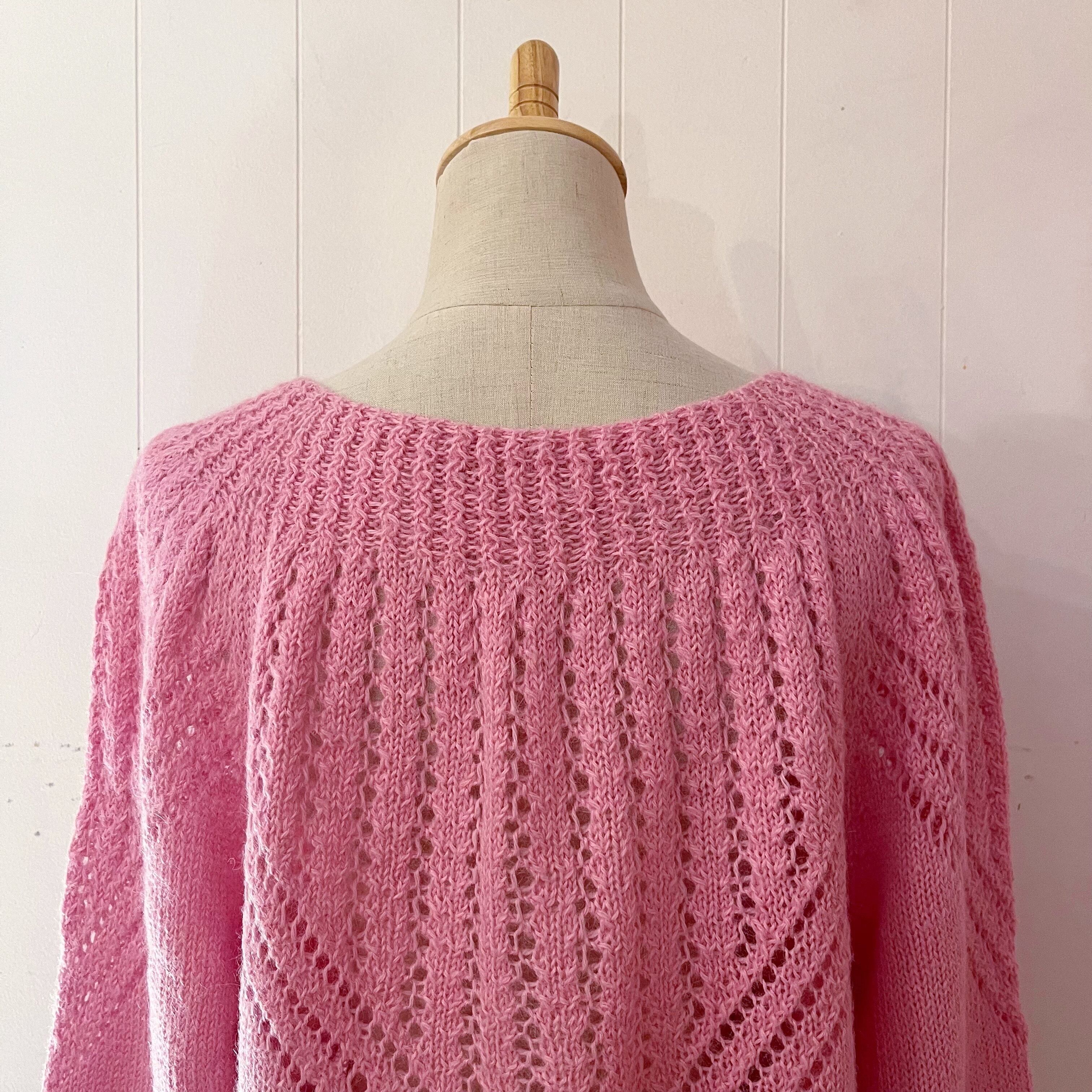 pink openwork knit sweater