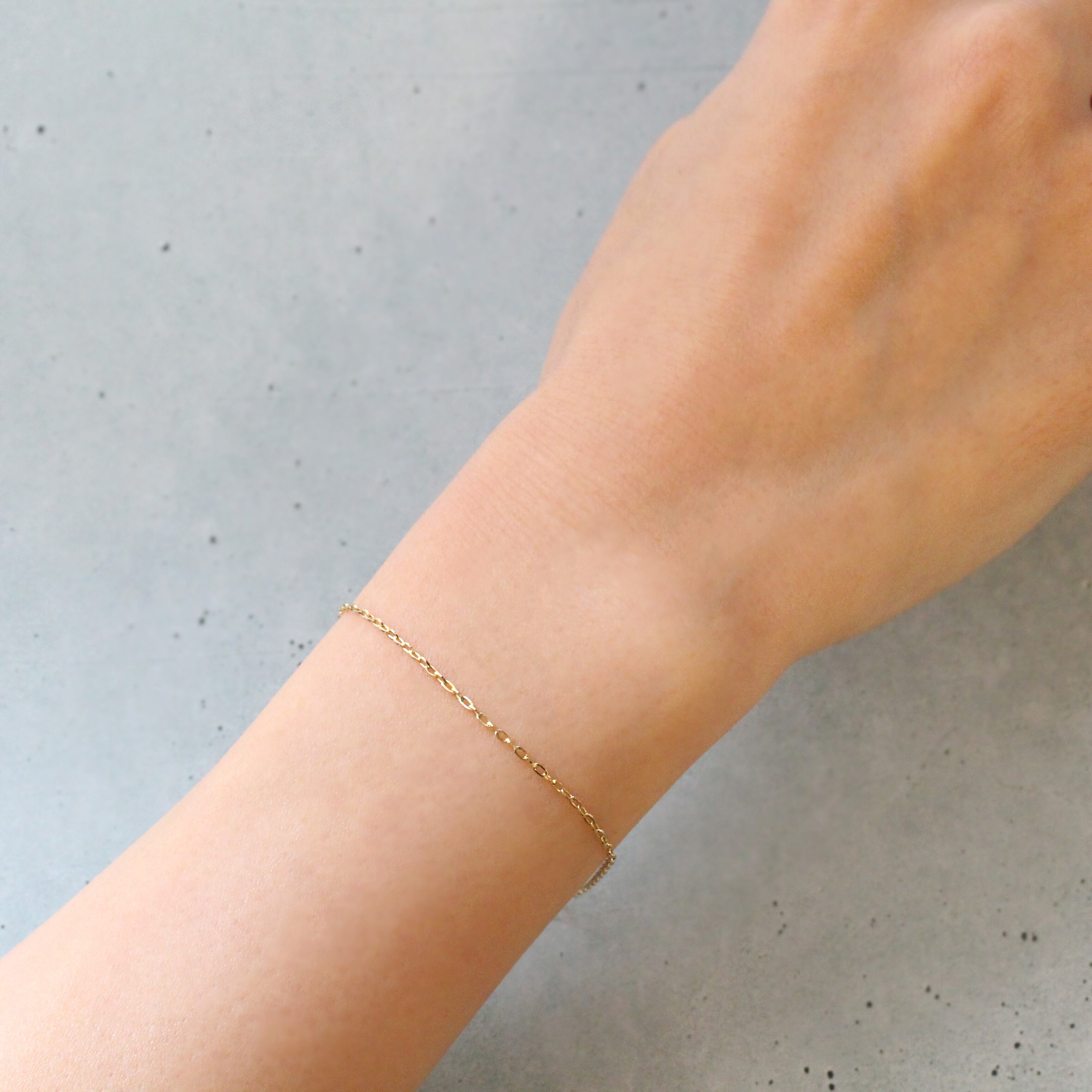 ゴールド ロゴ ストーン ブレスレット K10イエローゴールド チェーンブレスレット〈シャイン〉 No.52