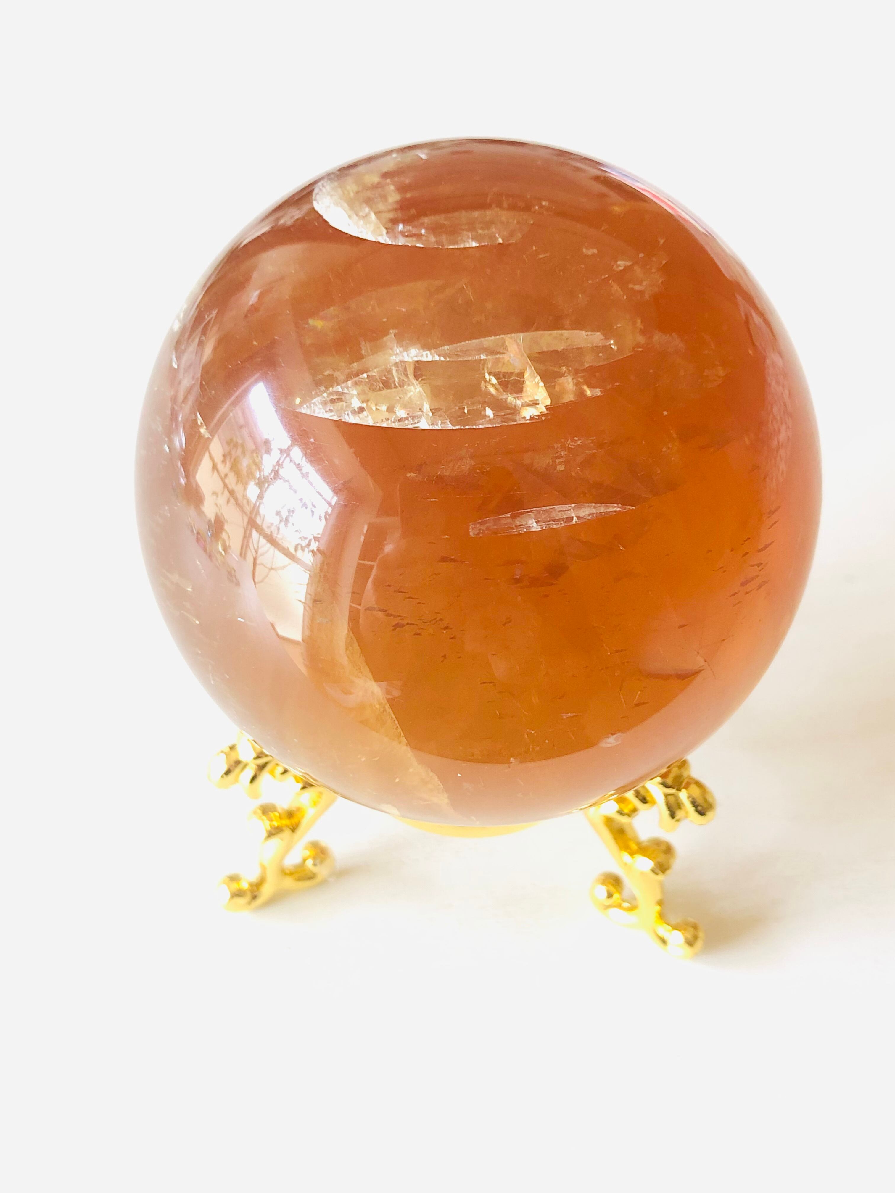 繁栄と成功の象徴！ゴールデンカルサイトの丸玉（83mm） | 虹色の星