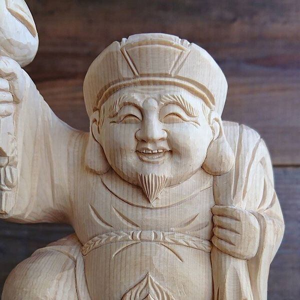 表情に魅力のある 大黒天木彫
