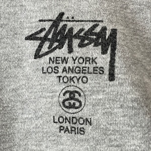 【STUSSY】USA製 WORLDTOUR スウェット プルオーバー パーカー ワンポイント バックプリント アメリカ古着