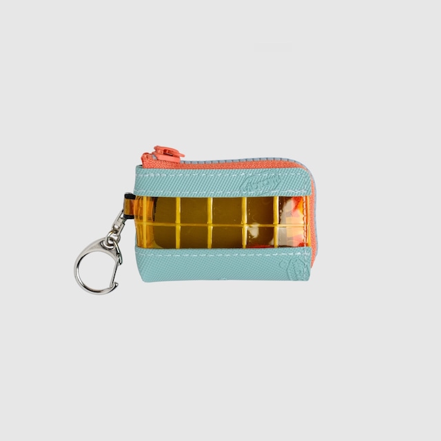 vibram coin pouch keychain (mint×orange) with blue glowing zip