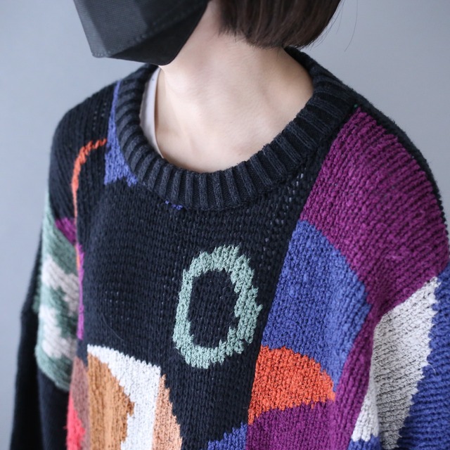 black base colorful art pattern over silhouette knit