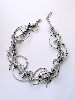 Silver orbital necklace.