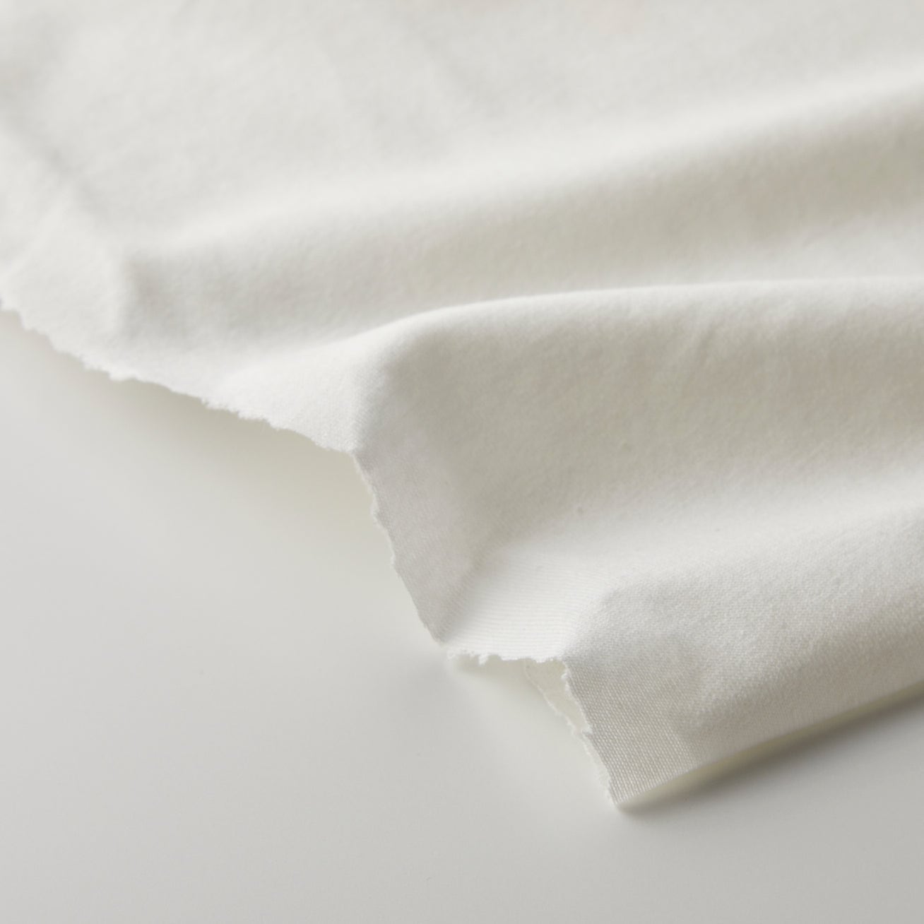 97-520-2m-綿系-薄手天竺ニット-無地柄-ホワイト | 生地のM