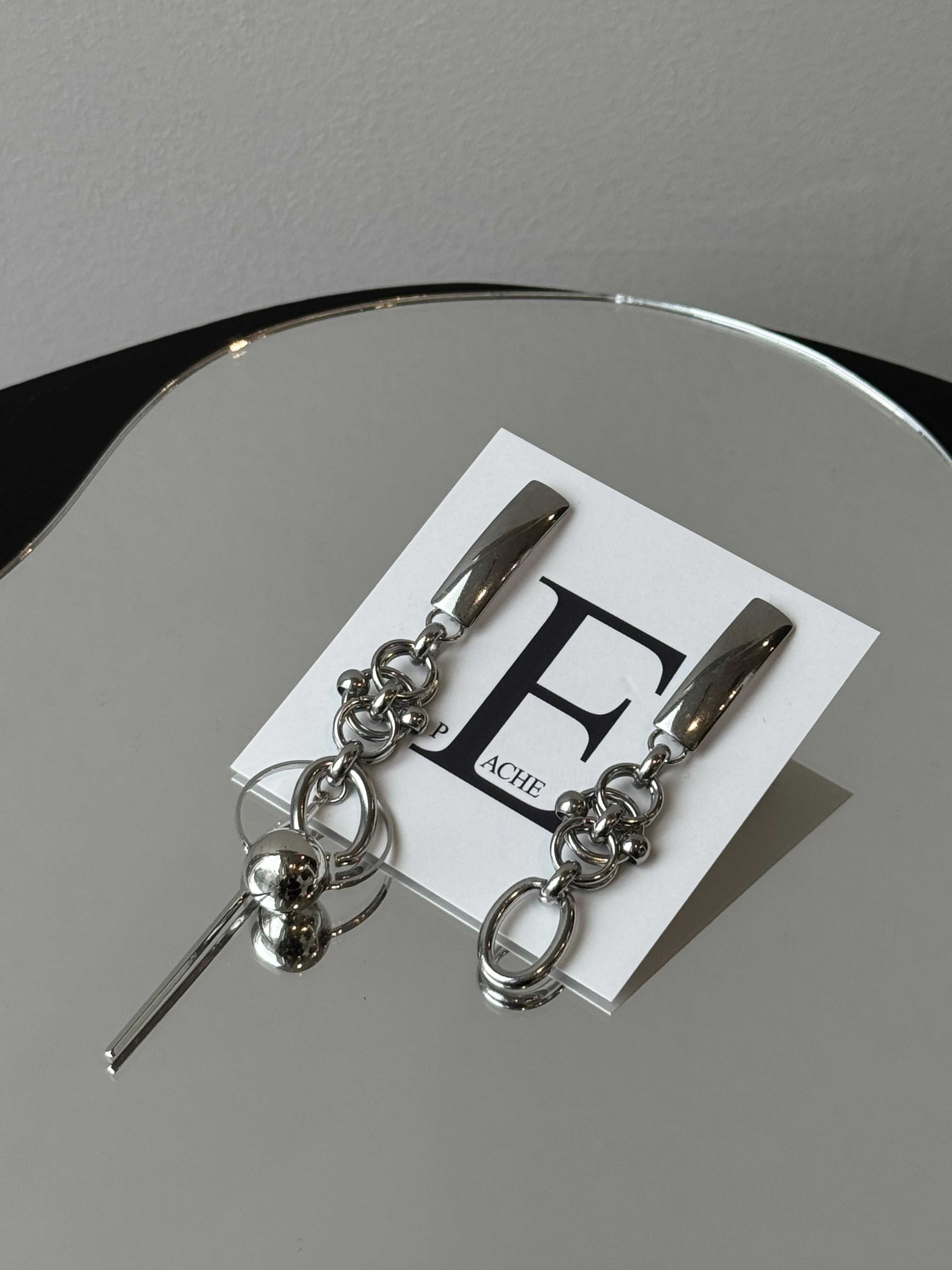 silver stick circle random mix asymmetry