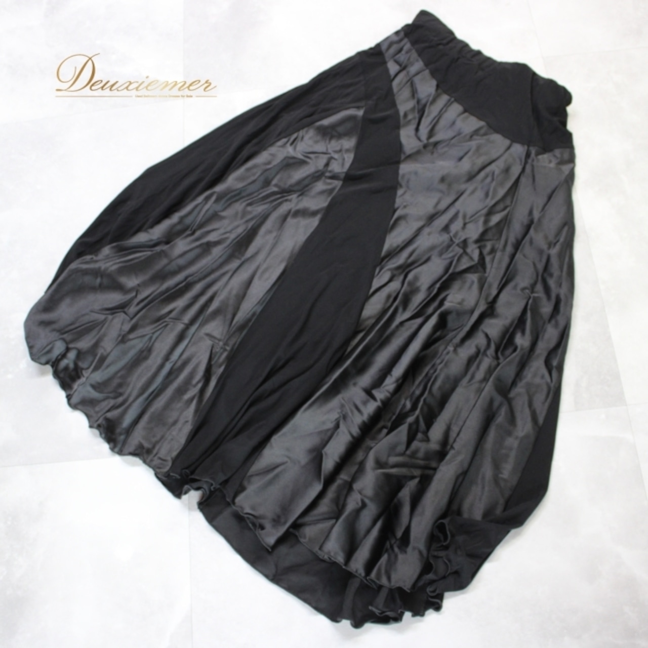 社交ダンス 衣装 スタンダード スカート レッスンウェア 練習着 オールシーズン 黒 ブラック系 無地 シンプル 光沢感 PROPOSE フォーマル ファッション おしゃれ ダンスウェア 伸縮性 洗練 プロ仕様 動きやすい 快適 ユニセックス シンプルスタイル 高品質 ポリエステル ポリウレタン エレガント シルエット ゆったり フレア スカート 時間指定無し トレーニング ダンス練習 着回し コーディネート ブラックドレス 公式 トレンディ