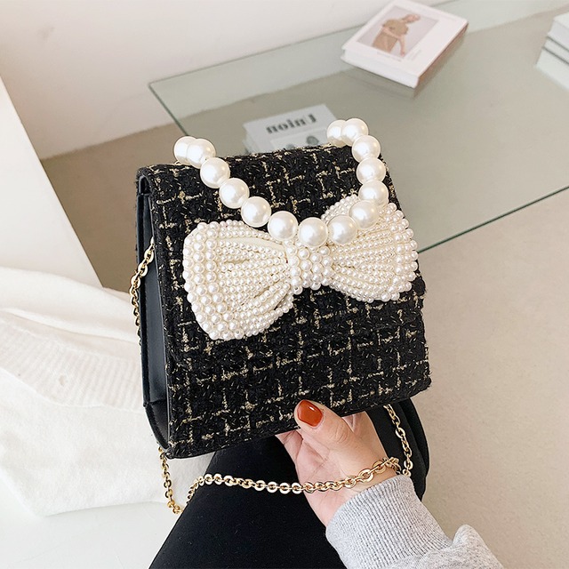 秋冬バッグレディース2020新しい流行のファッションパールポータブル小さな正方形のバッグワイルドインチェーンショルダーメッセンジャーバッグ Tiancai_Wing_Bag48872043731