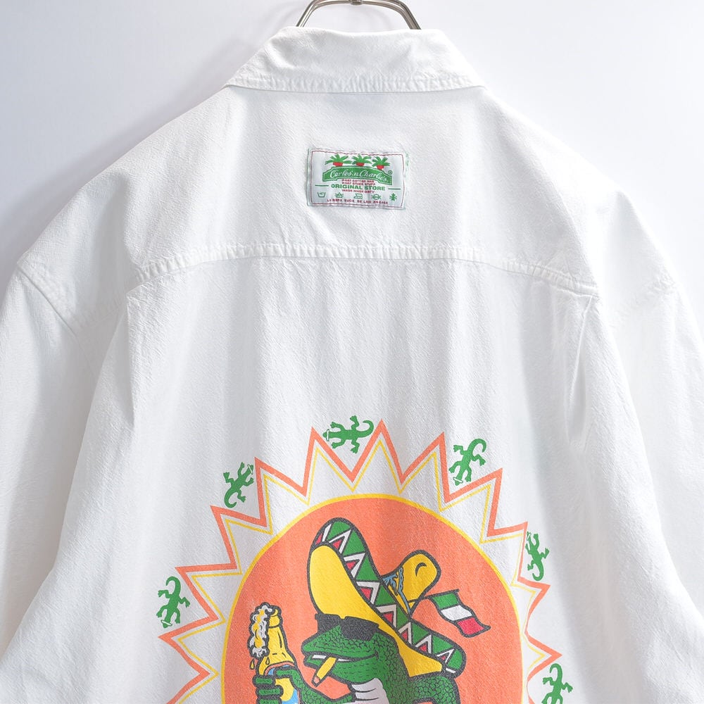 80~90s Carlos'n Charlie's カルロスアンドチャーリーズ バックプリント キャラクター デザイン 半袖 ボタンダウンシャツ 企業 スーベニア 白 ヴィンテージ ビンテージ USA アメリカ古着 メンズXL相当