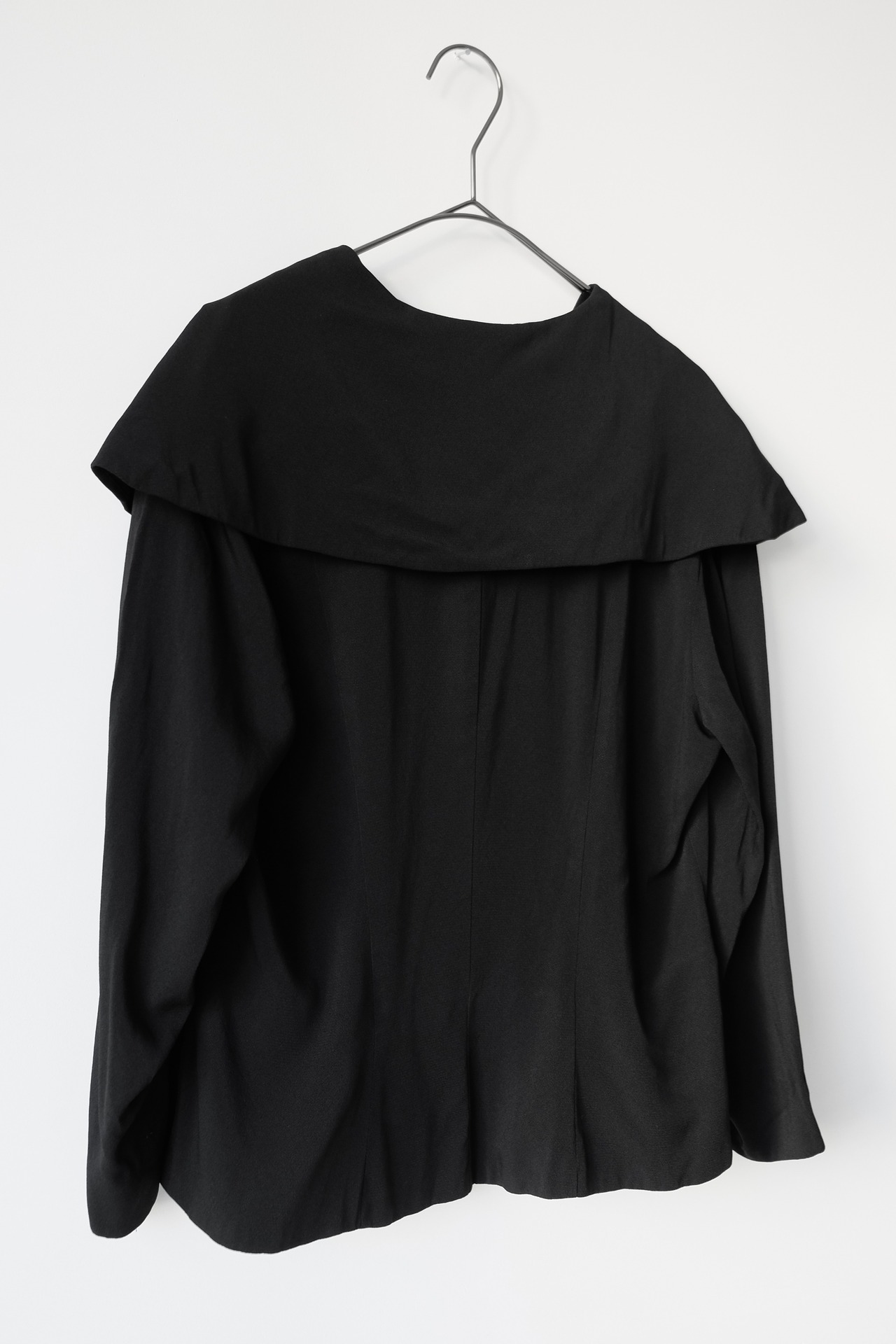 Black platter collar blouse