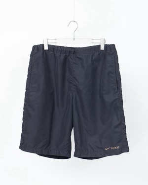 "NIKE" baggy silhouette nylon short trousers