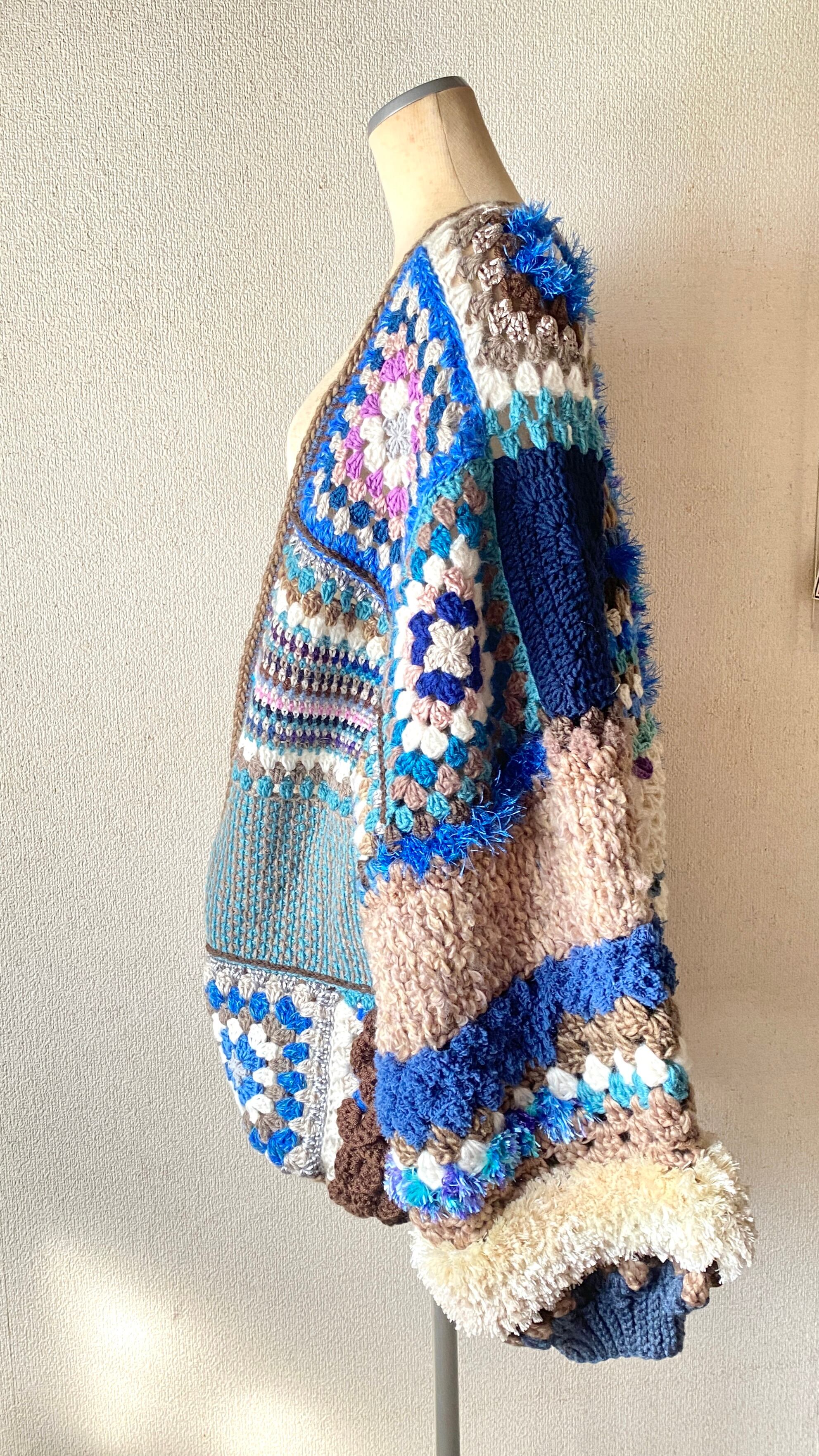 Crocheted granny hexagon and square motif asymmetrical cardigan