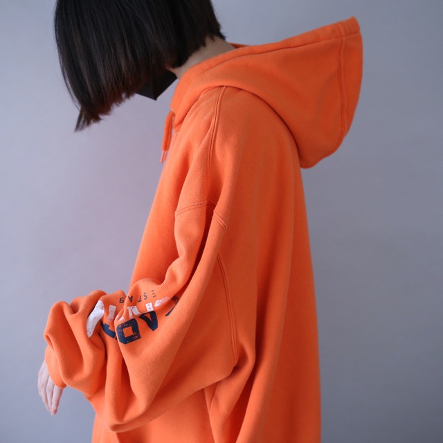 "Carhartt" sleeve logo printed XXXL over silhouette orange sweat parka
